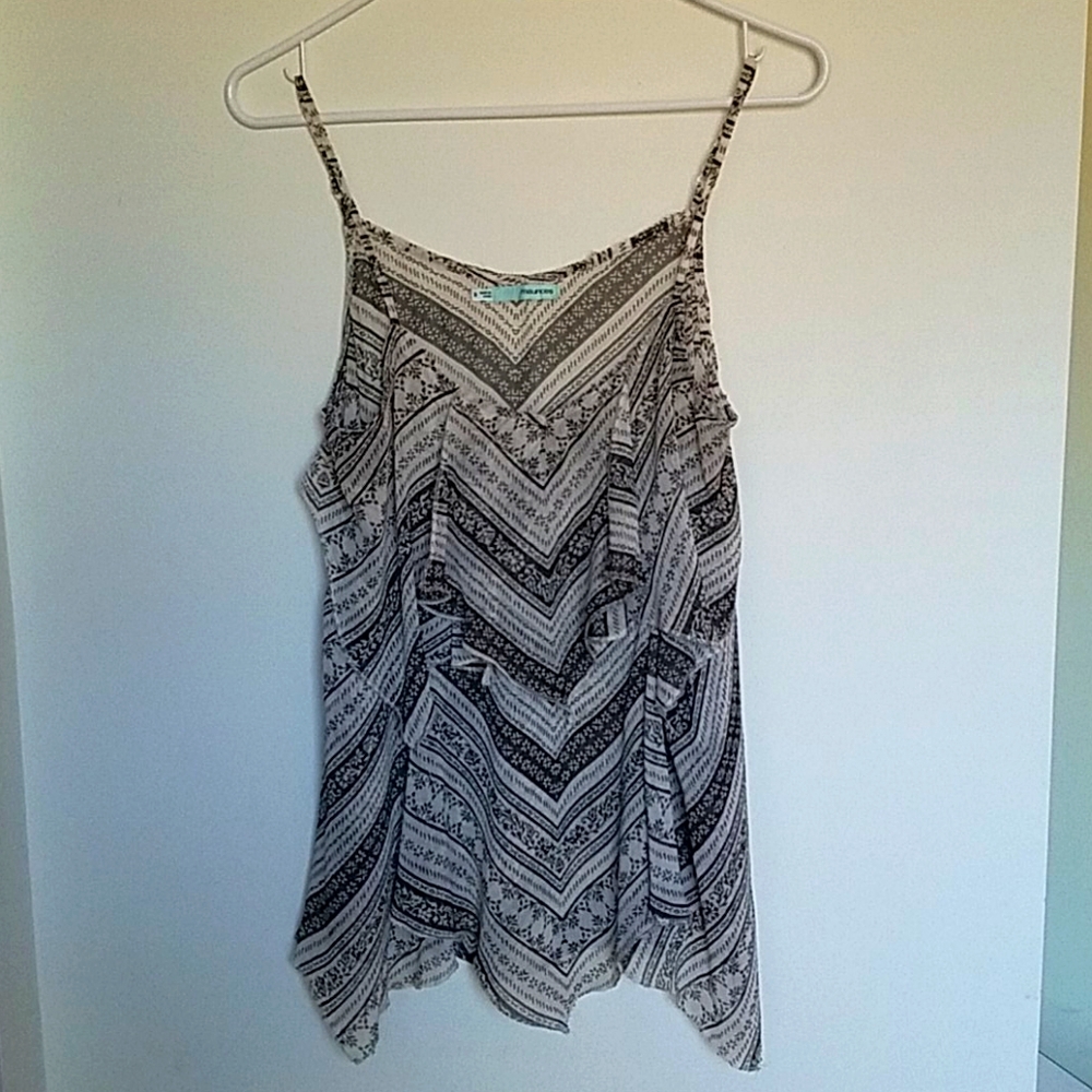 Limited tank blouse with ruffles in the front